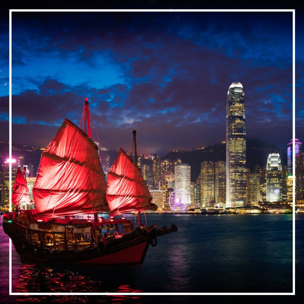 Traditional boat sailing in Hong Kong at Night