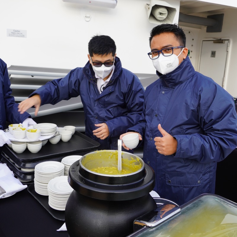 Holland America crew serving traditional dutch pea soup