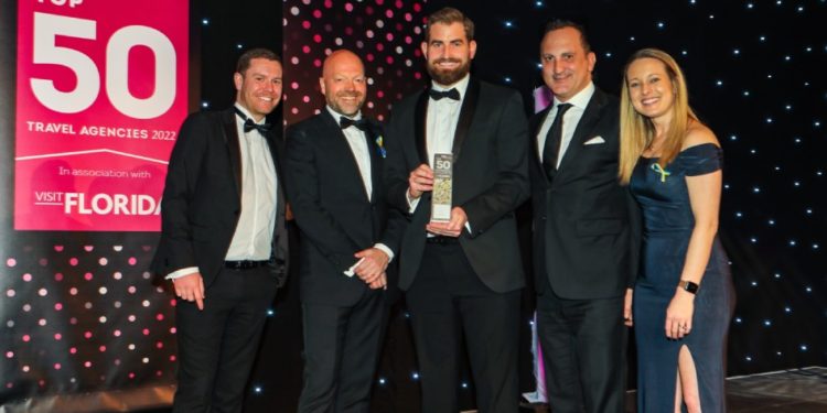 Paramount Cruises collecting the award for Top Ocean Cruise Agency at the TTG Top 50 awards