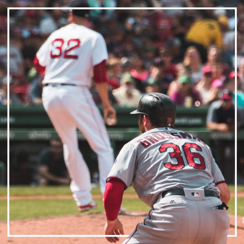 Baseball players at Fenway Park in Boston