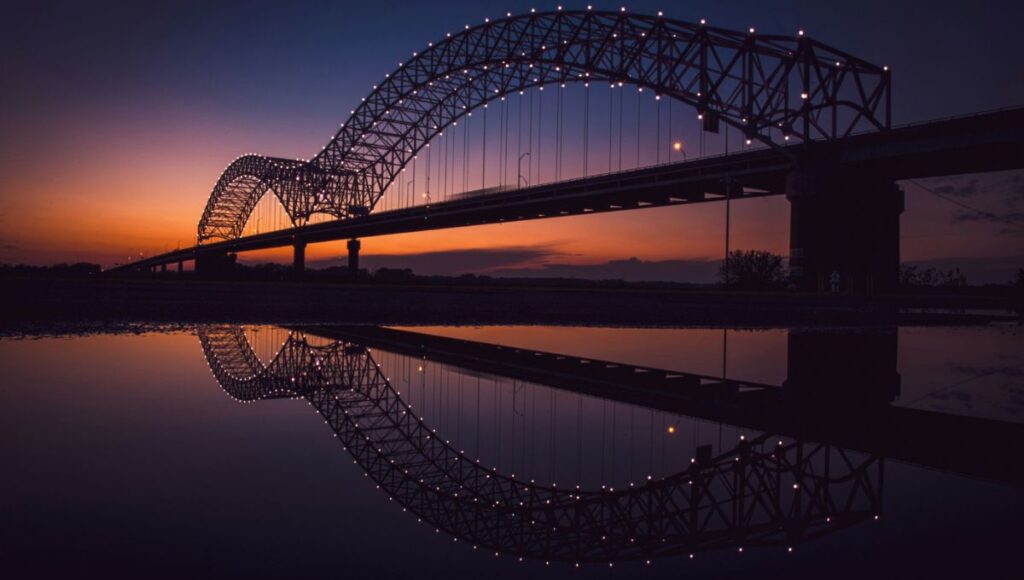 Mississippi River bridge at sunset Memphis Mississippi river cruise landmark