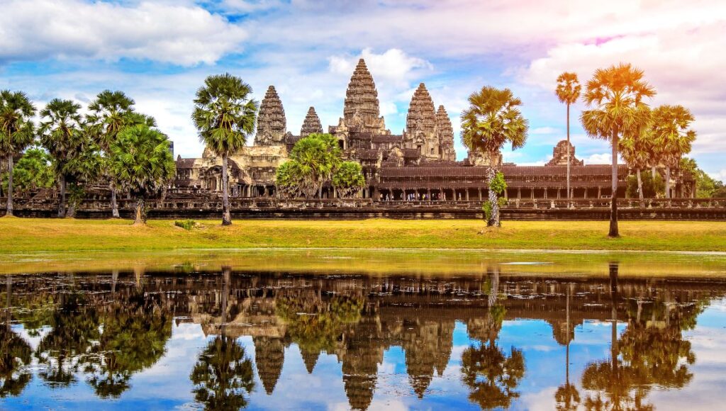 Angkor Wat temple complex Cambodia sunrise reflection Mekong river cruise destination