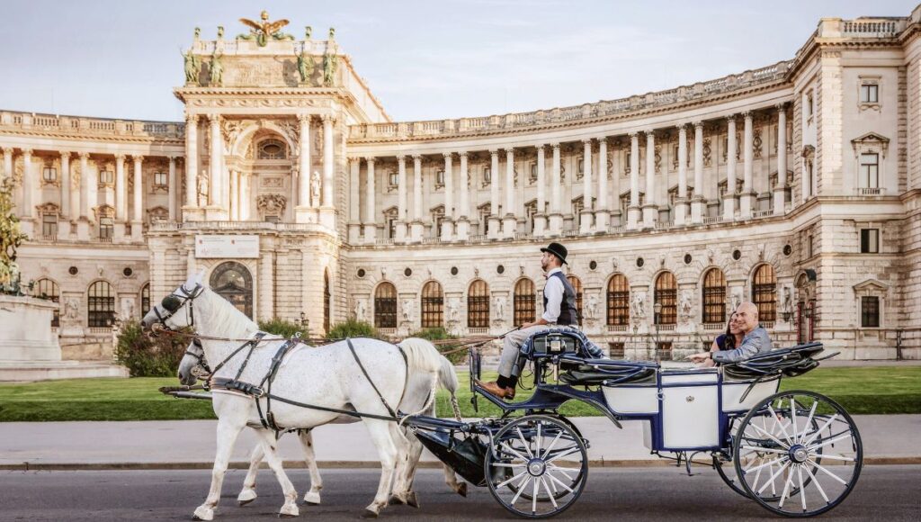 Horse carriage outside Hofburg Palace Vienna Danube river cruise city excursion