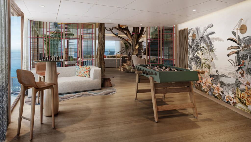 Ultimate Family Treehouse suite interior on Hero of the Seas with games area and ocean views