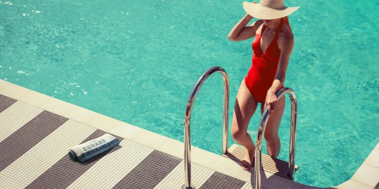 Chief Cruise Tester inspecting the pool deck on a luxury cruise ship