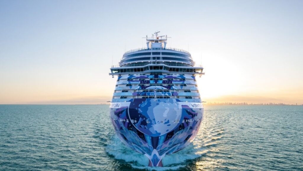 Front view of Norwegian Luna cruise ship showcasing hull artwork at sea
