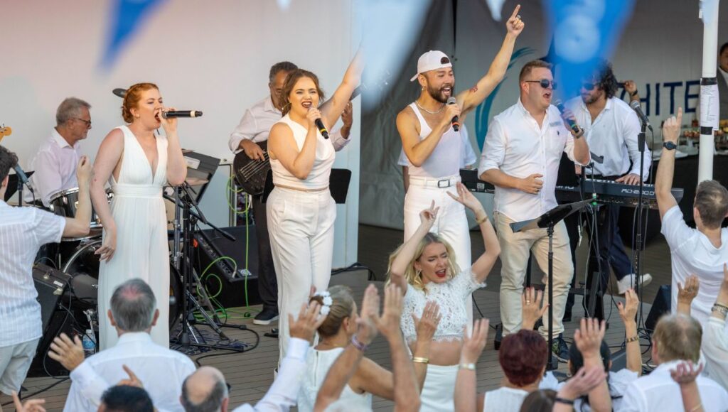 Live band performing at the White Night party on the deck of Azamara Journey during the Azamara Seville to Lisbon cruise