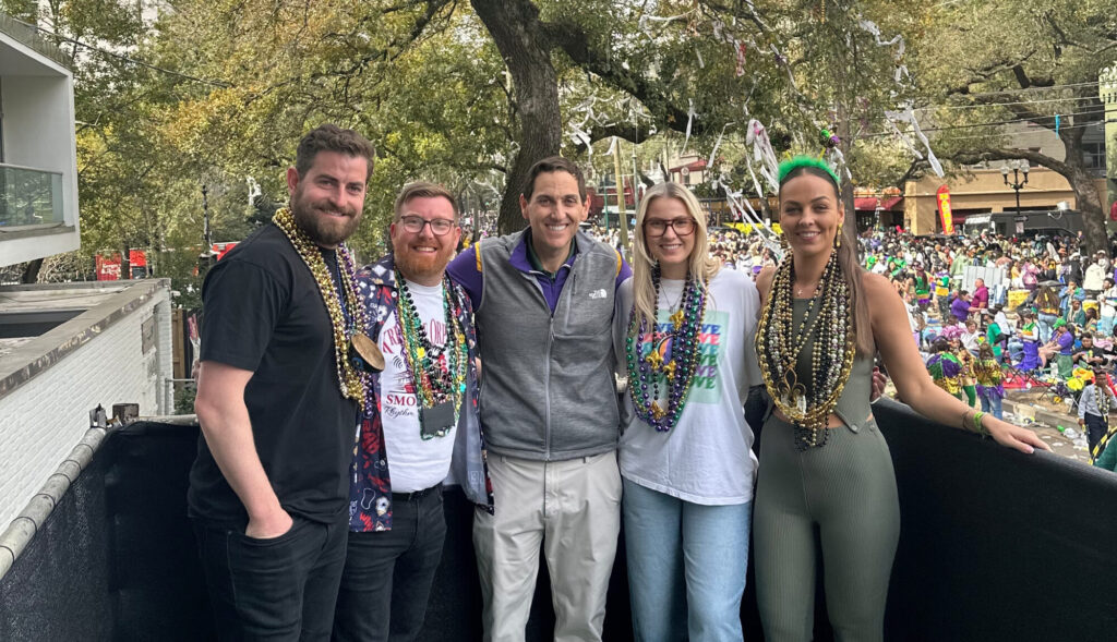 The Paramount Cruises team with Walt Leger, President & CEO, New Orleans & Company during the Mardi Gras parades