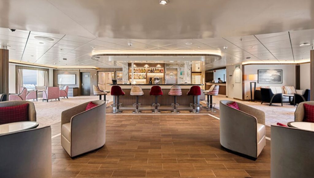 Bar and lounge seating on Douglas Mawson, with stools at the counter and armchairs around low tables