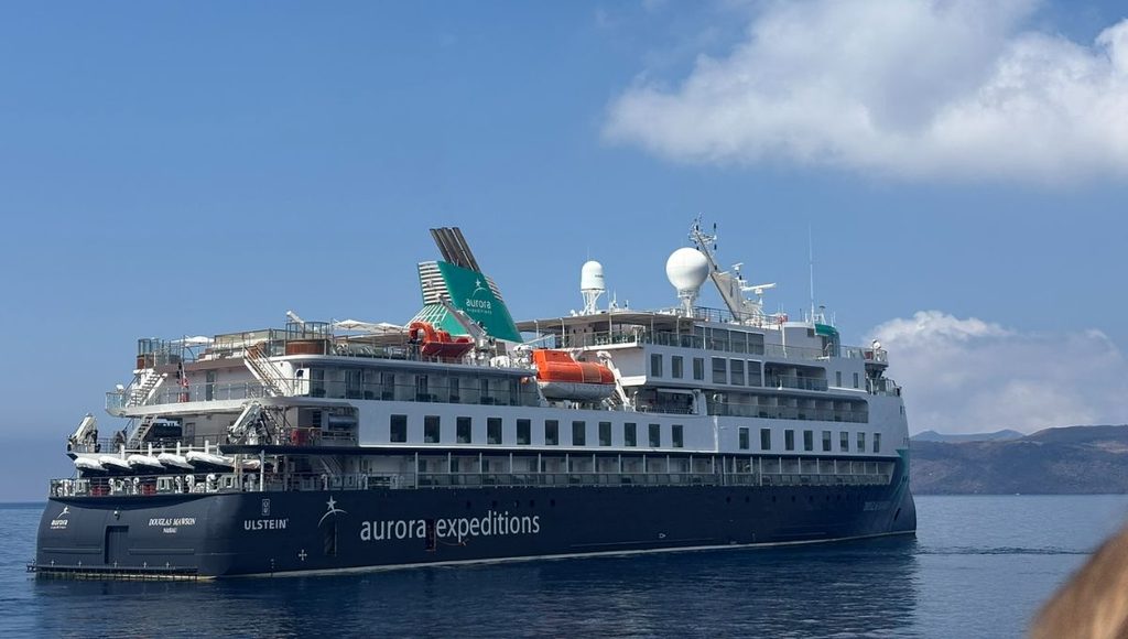 Douglas Mawson at anchor in the Greek Islands, seen from the tender with the Aurora Expeditions livery along her hull