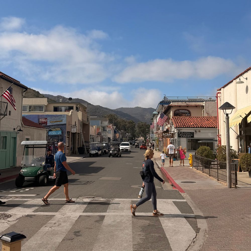 Street view on Catalina Island with mountains in the background.