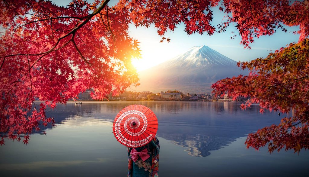Japan Mt. Fuji woman looking over lake