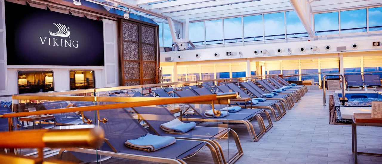 Comfortable lounge beds by the pool