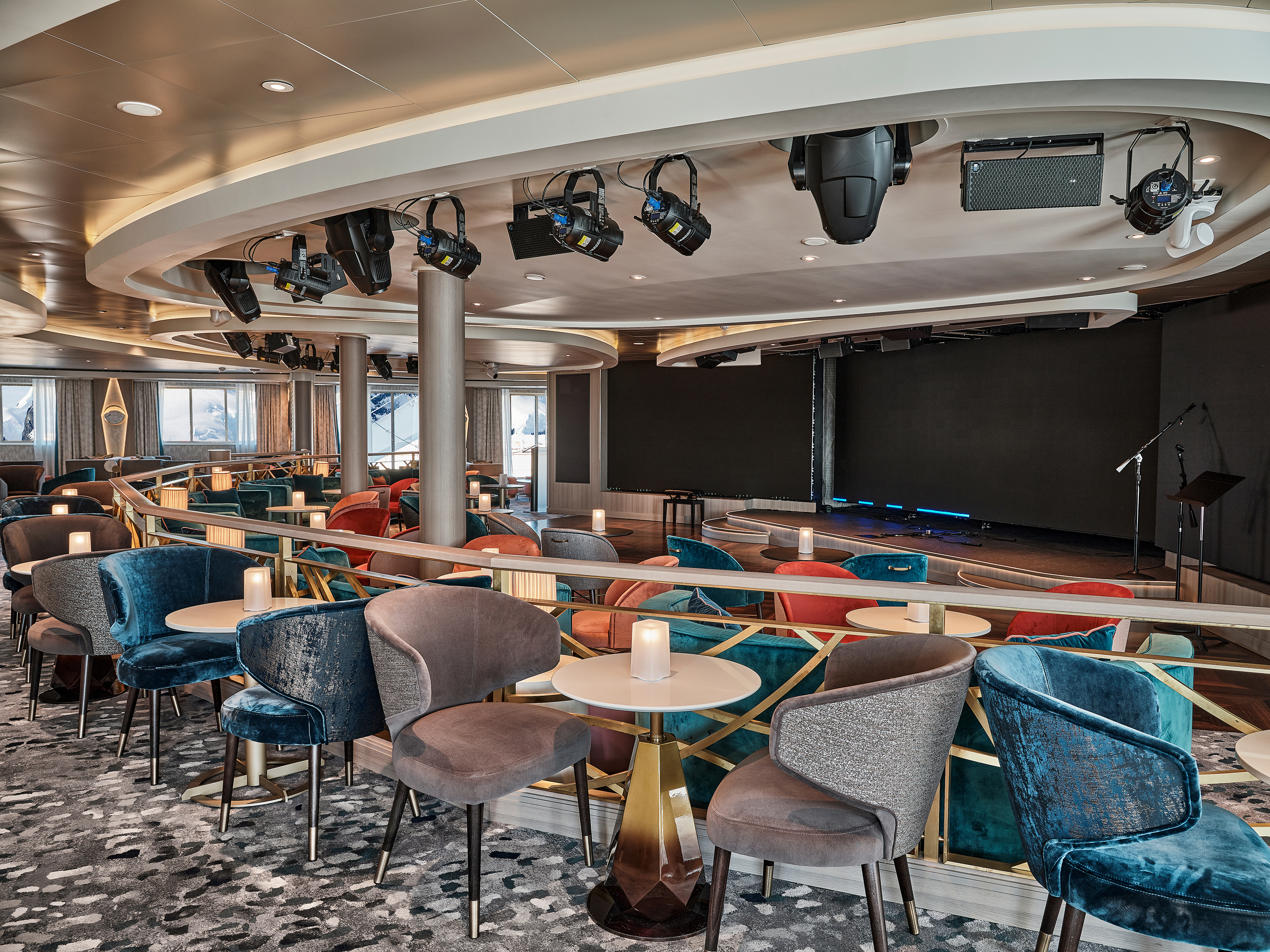 The Explorer Lounge serves as the central hub for coordinating shore excursions while on board