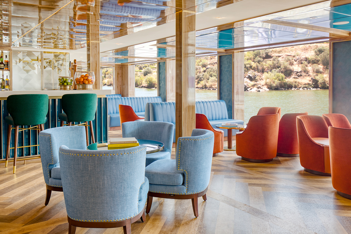 Grab a cocktail from the bar and relax to stunning river views outside the floor-to-ceiling windows