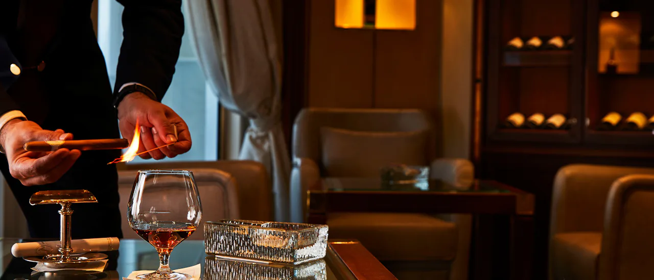 Connoisseur’s Corner offers exceptional cognacs and a premium selection of cigars to purhcase