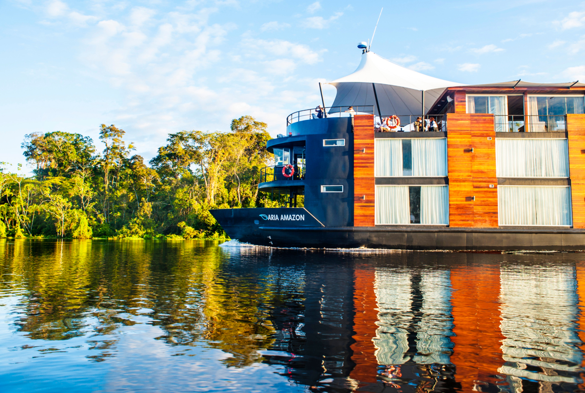 On board, 16 spacious suites with floor-to-ceiling windows give guests a full view of the Amazon’s river and rainforests