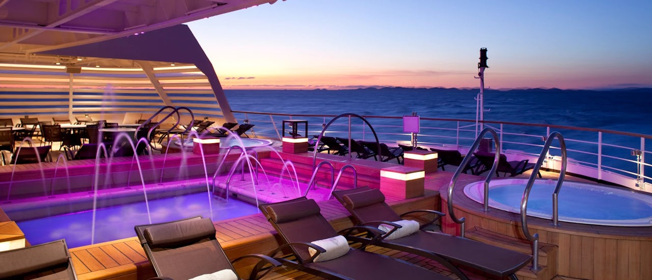 Comfortable lounge beds by the pool