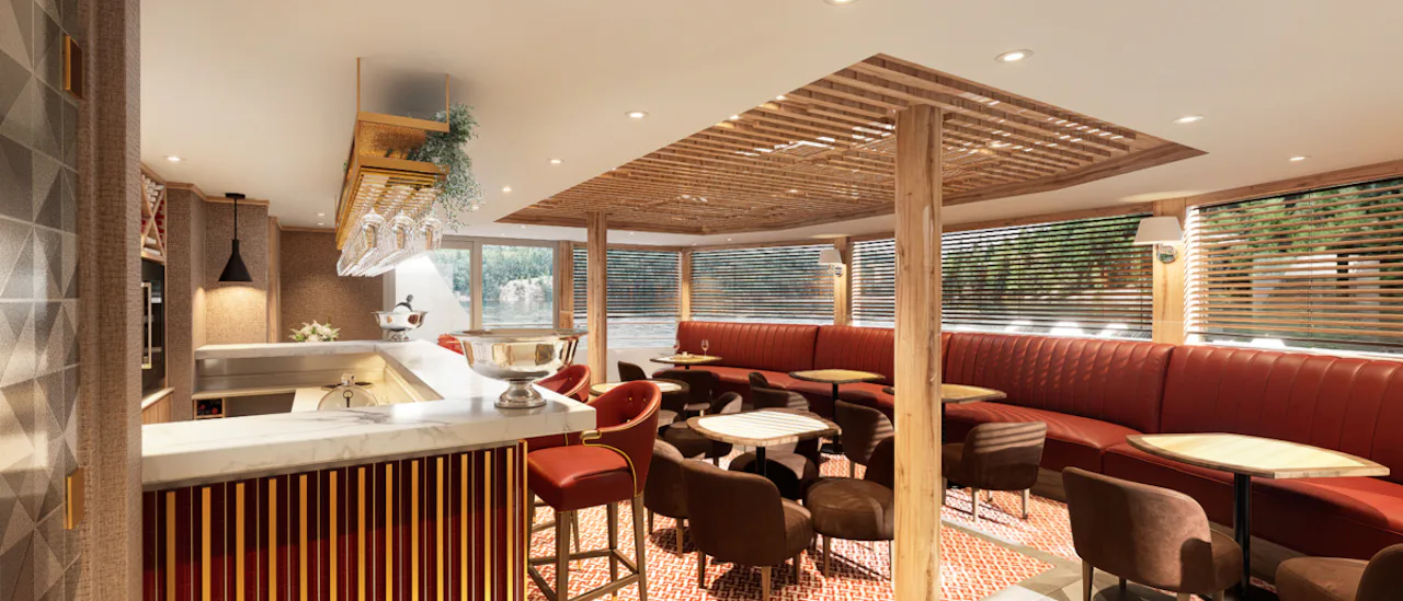 Grab a cocktail from the bar and relax to stunning river views