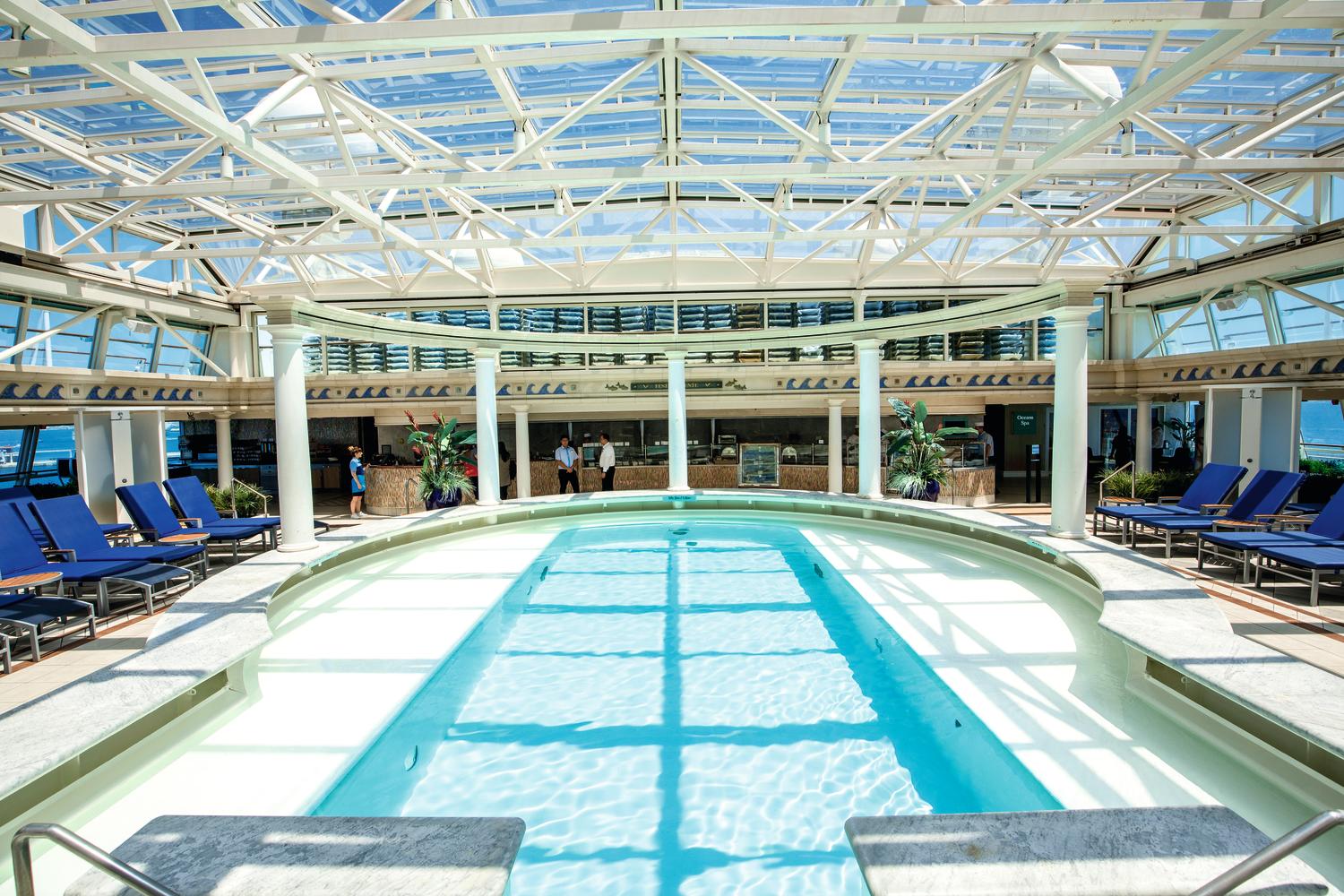 The indoor pool has a huge glass canopy roof and rows of comfortable loungers