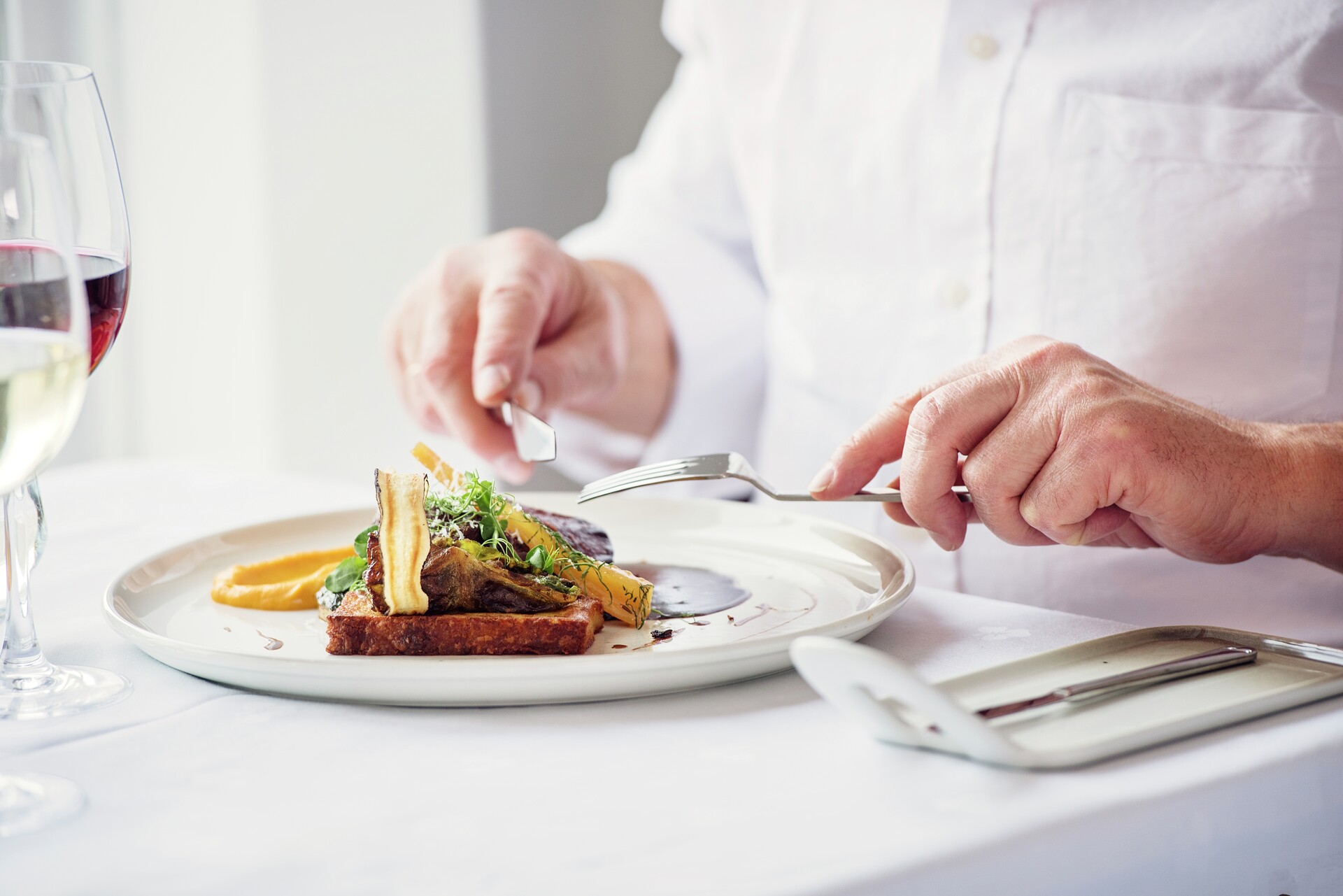 Indulge in a luxurious dinner at "Kusten," the ship's à la carte restaurant