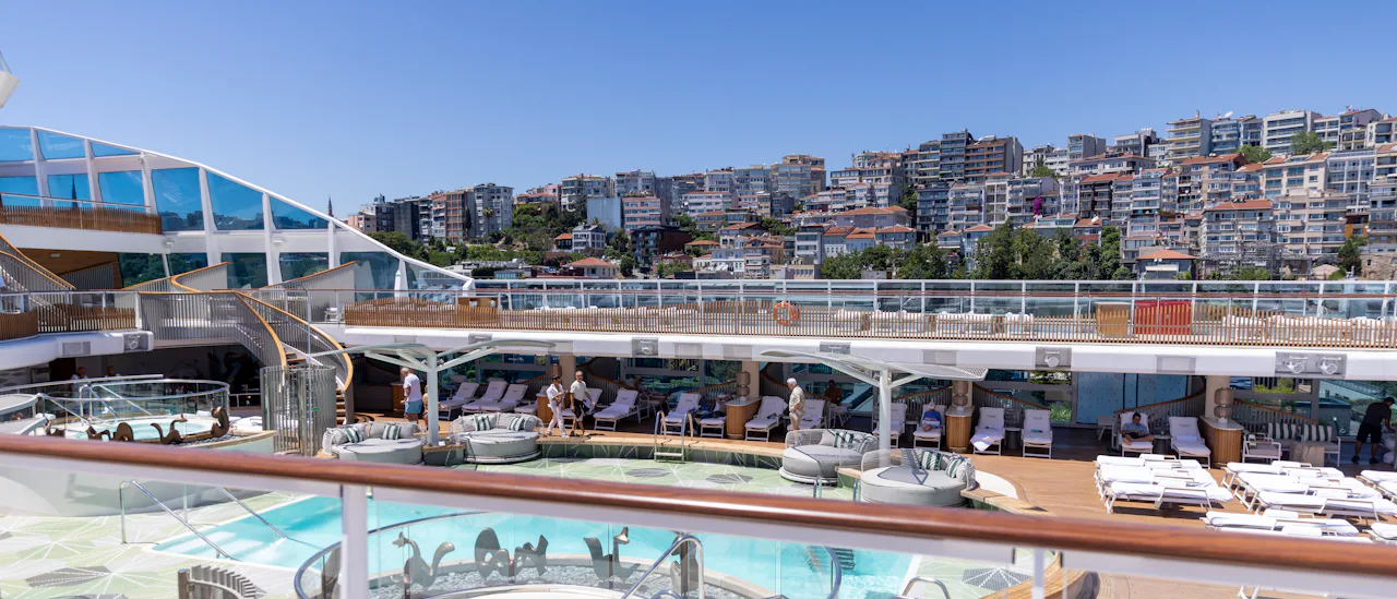 Oceania Vista’s Pool Deck reflects the beauty of the surrounding sea.