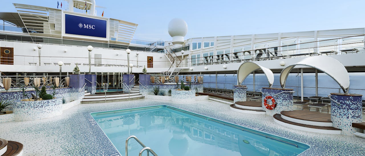 The Coral Bay Pool Area offers a swimming pool and poolside cinema, the perfect spot to relax and enjoy outdoor entertainment