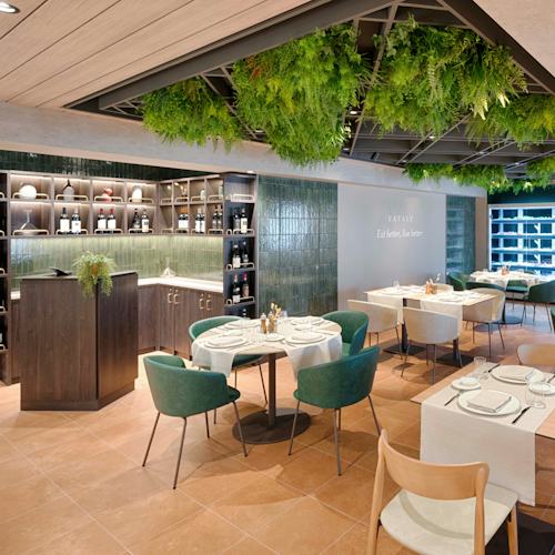 MSC World America - Eataly Sign Speciality restaurant Public areas Sitting area Table Plant Chair Alcohol Wine Glass