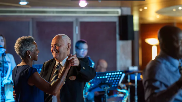 Fred. Olsen Cruise Lines Solo Cruising - Solo Guest Dancing with Dance Hosts in Ocean Bar