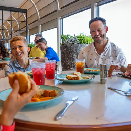 Disney Cruise Line - Disney Wish - Guests dining at Marceline Market