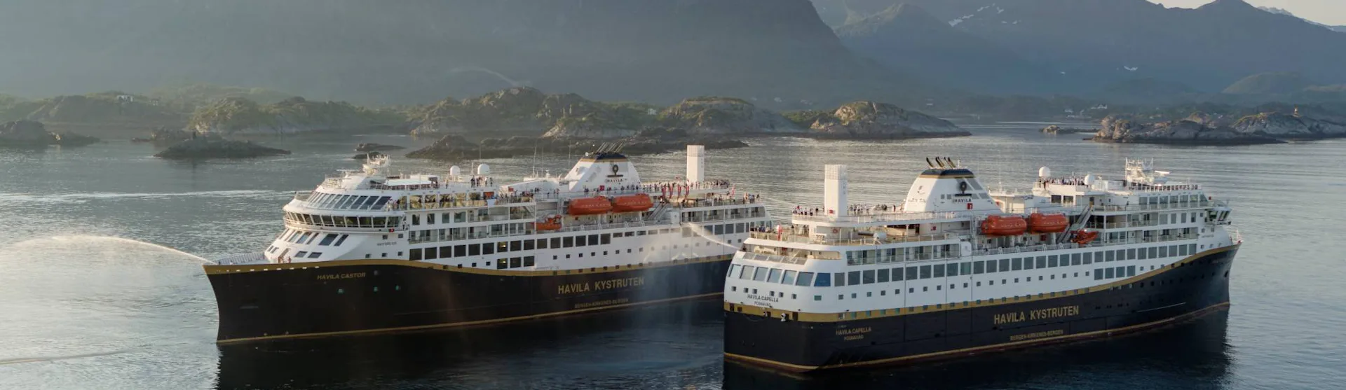 Havila Voyages - Havila Castor and Havila Capella sailing past each other
