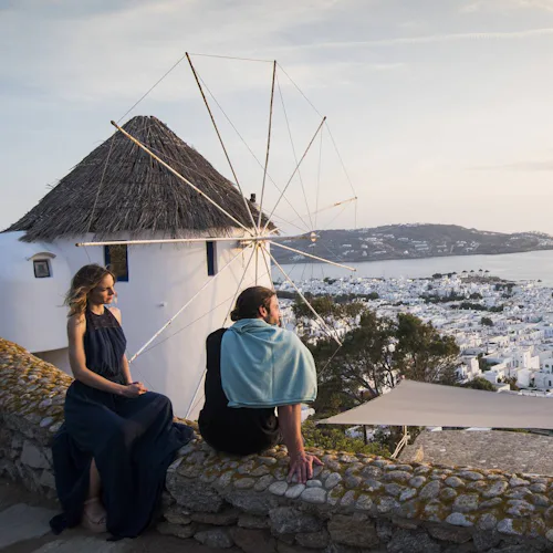 Celestyal - Greek Isles - Couple Enjoying Views over Mykonos