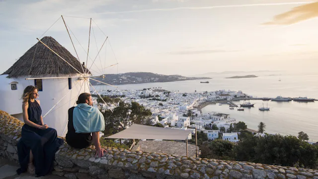 Celestyal - Greek Isles - Couple Enjoying Views over Mykonos