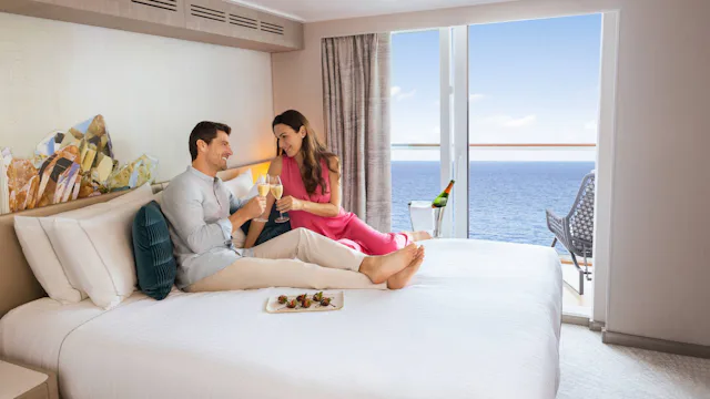 NCL - Couple on Prima Honeymoon Balcony