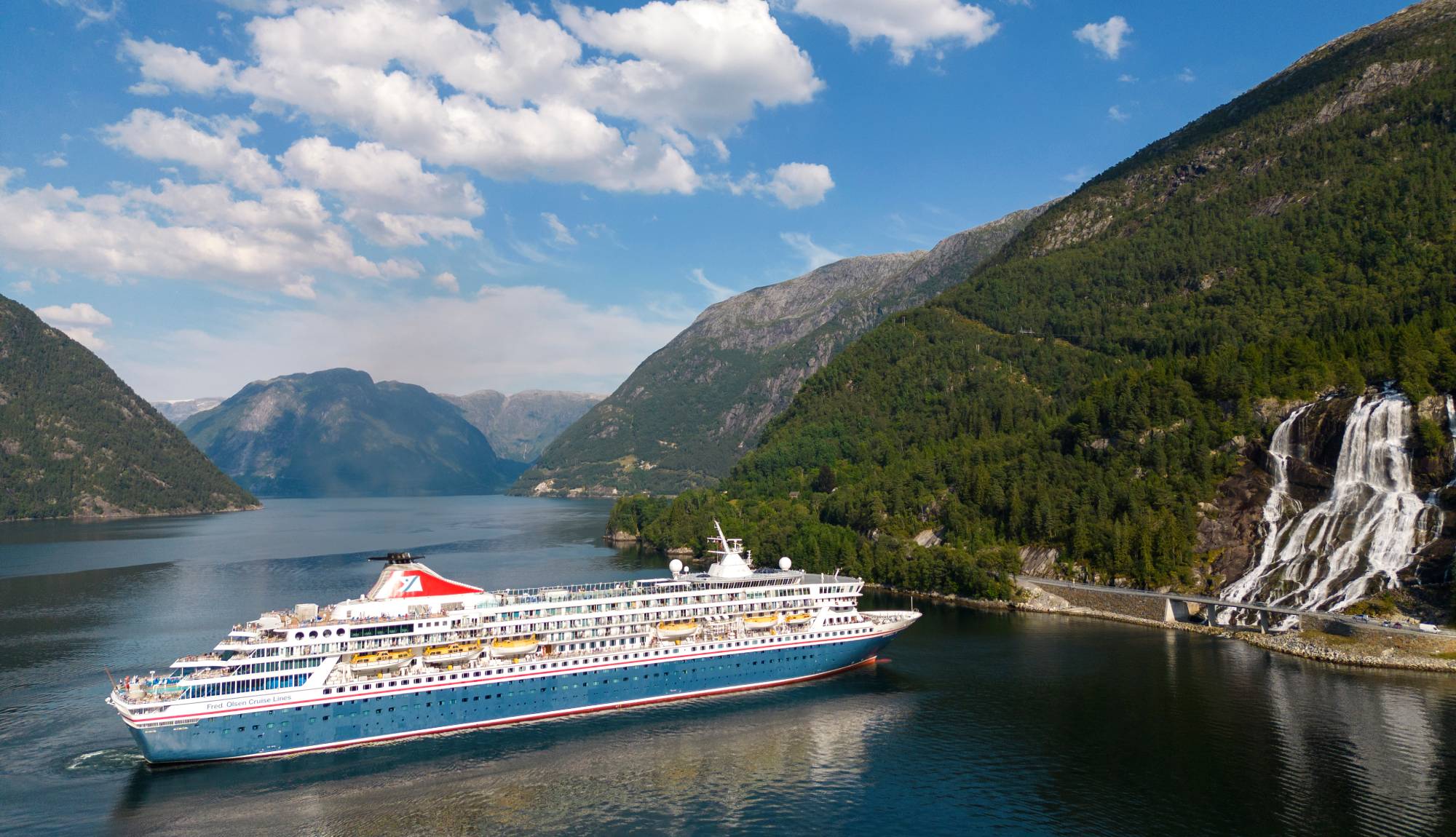 Fred. Olsen Cruise Lines Norway - Balmoral cruising by Furebergsfossen waterfall, Norway
