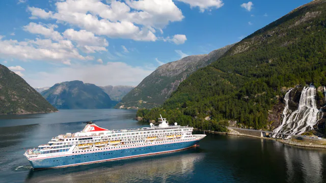 Fred. Olsen Cruise Lines Norway - Balmoral cruising by Furebergsfossen waterfall, Norway