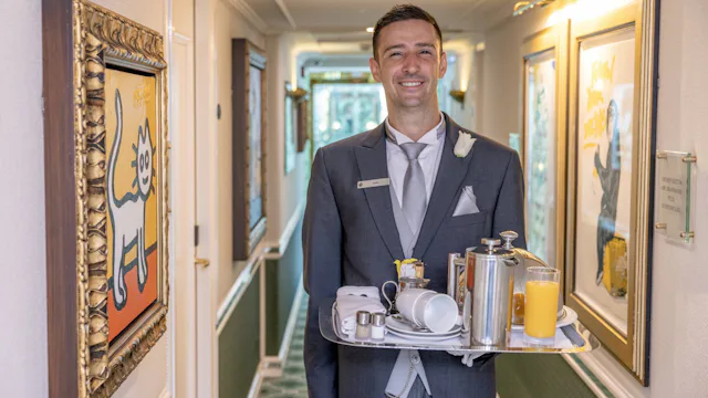 Uniworld River Cruises - Butler bringing room service, corridor, S.S Catherine