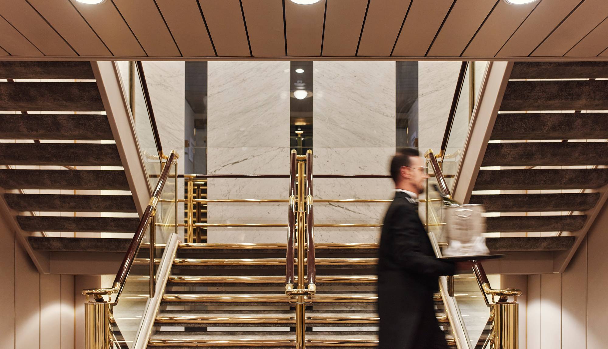 Crystal Cruises - Butler carrying champagne