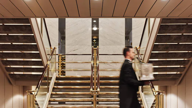 Crystal Cruises - Butler carrying champagne