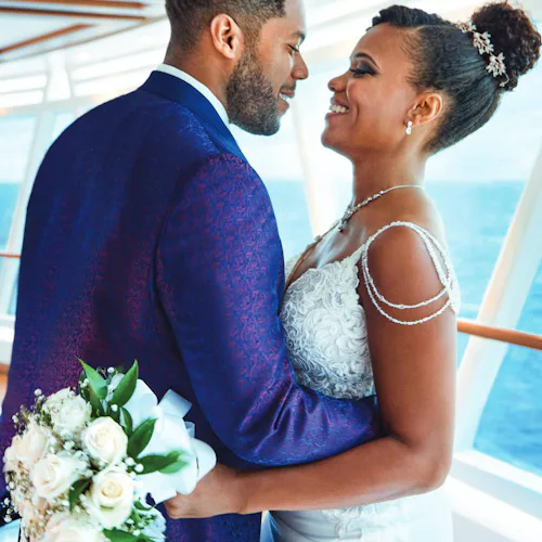 Weddings at Sea - Couple married on the skywalk Princess Cruises