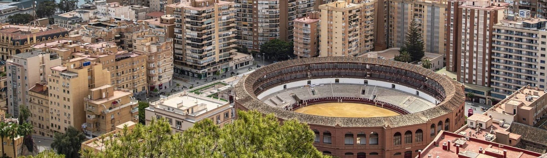 View of Malaga bull ring and the ocean in the background