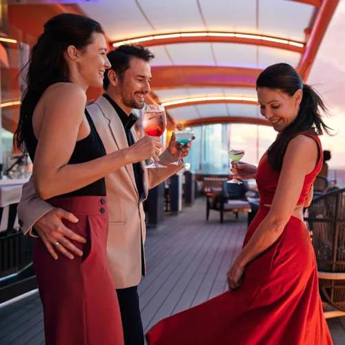 People enjoying drinks on the Magic Carpet
