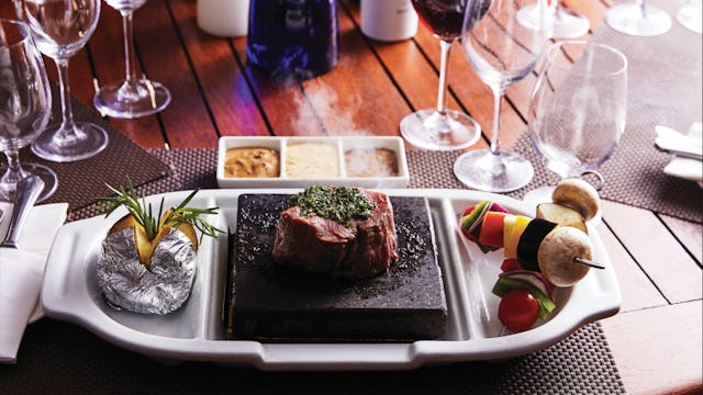 Dinner served at an onboard restaurant