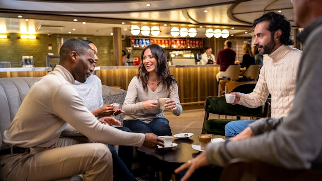 Guests enjoying coffee onboard Seabourn Venture