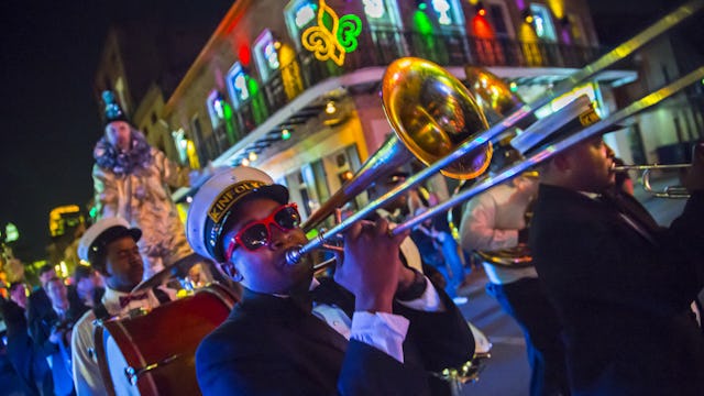 Mardi Gras Krewe rolling through uptown New Orleans