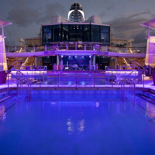Pool deck onboard Celebrity Cruises ships at night