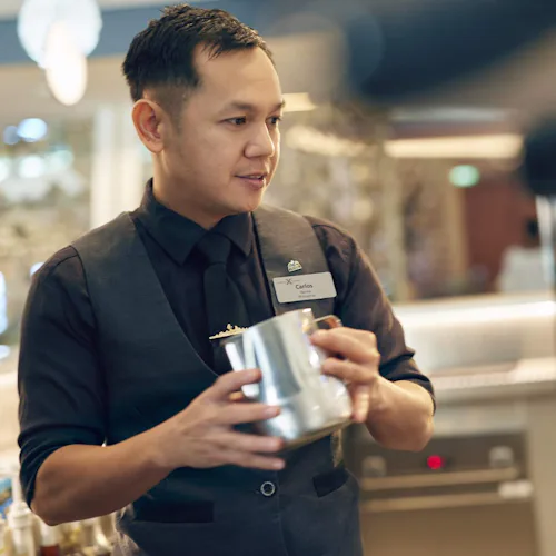 Barista serving coffee at Cafe Al Bacio