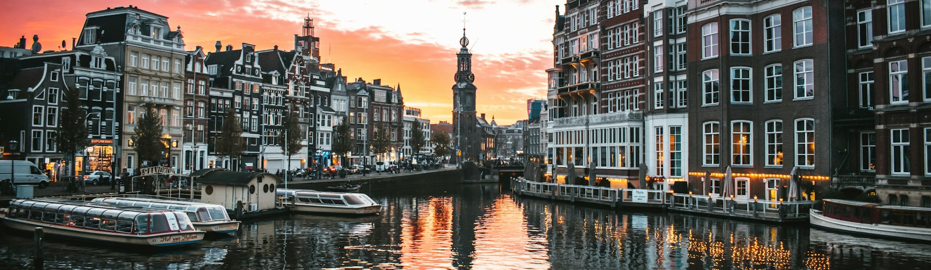Views of the canals of Amsterdam at sunset.