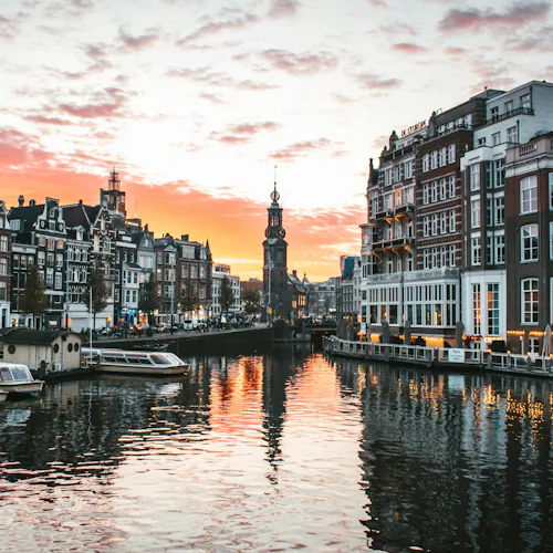 Views of the canals of Amsterdam at sunset.
