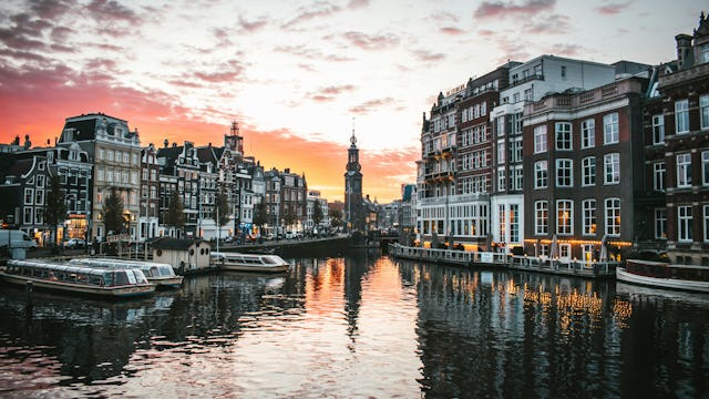 Views of the canals of Amsterdam at sunset.